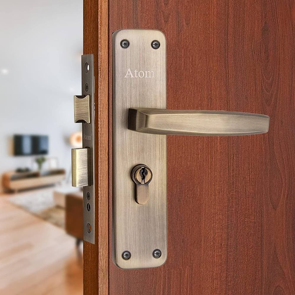 Commercial locksmith installing door hardware